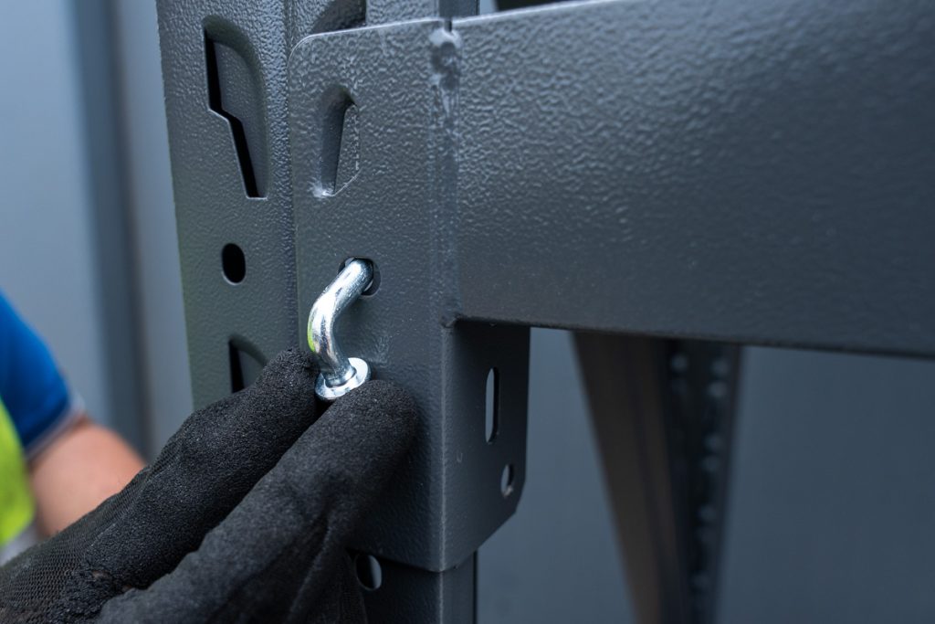 Finishing Touches - Hand-insert a lock pin into a pinhole
