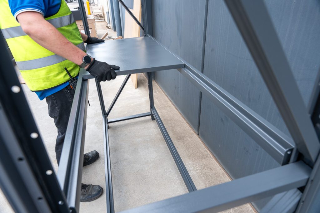 Finishing Touches - Placing a shelf unit onto the crossbeams