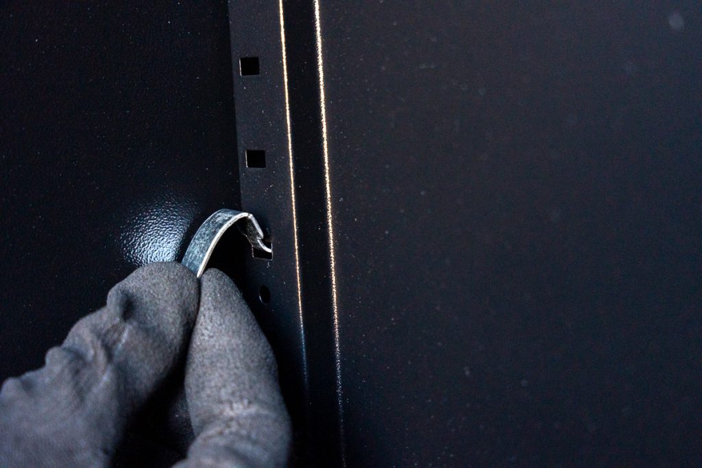 Finishing Touches - Attach the shelf supports by hooking it into a slot.