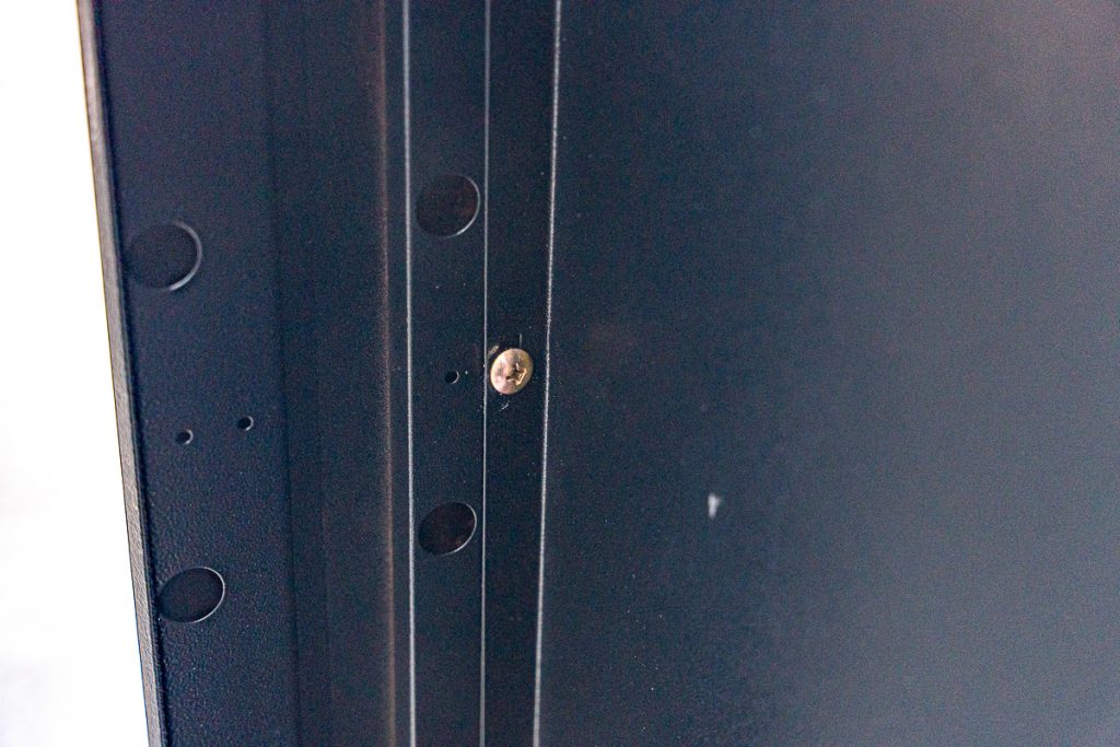 Building the Frame - Secure the bottom panel with a single screw in the middle.