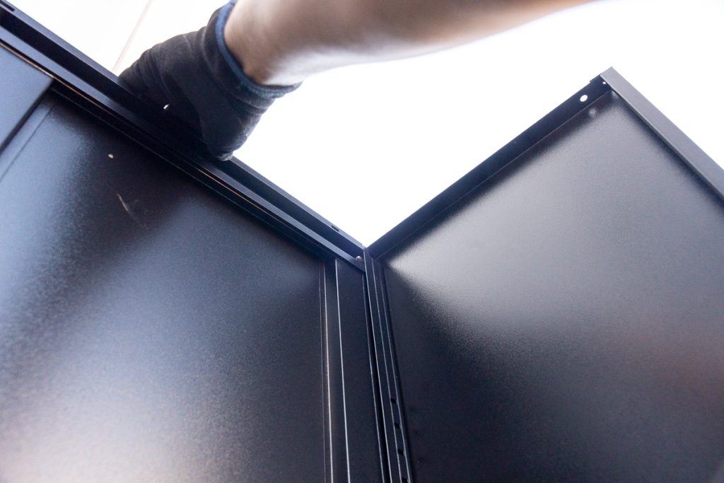 Building the Frame - Top view of the side panel slotting into the door